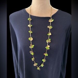 Jules Goldtone Necklace with green beads, gold charms and crystal beads. (B-L)